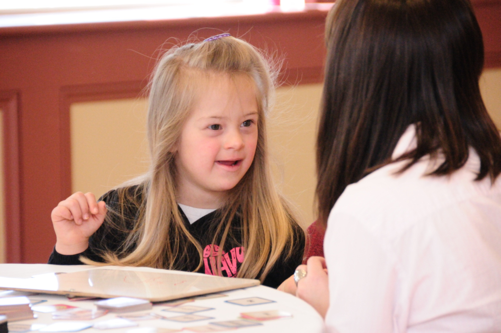 teacher child with Down syndrome